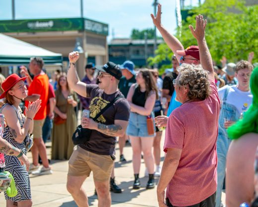 Spectators dancing and having fun